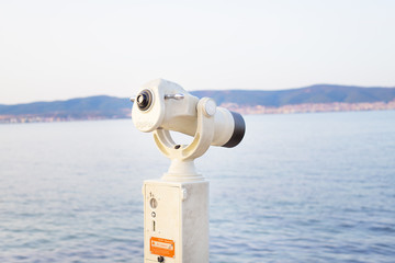 Telescope on the sea-summer, sun, sea beach