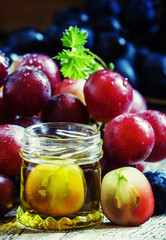 Essential oil of grape seeds, selective focus