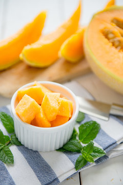cantaloupe melon on the wooden table