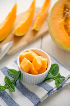 cantaloupe melon on the wooden table