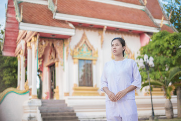 Buddhist Nuns meditation in  thailand. Concept: Lent