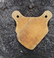 vintage cutting board on old wooden background