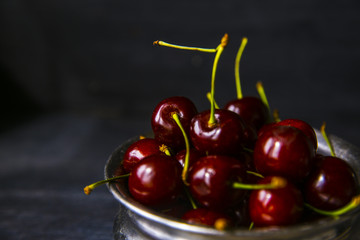 cherries in bowl on the table