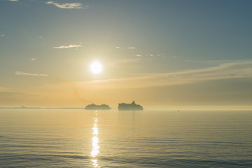 Sunset and cruise ship on the sea