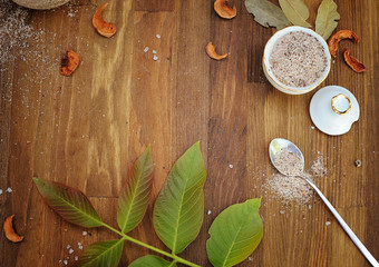 Authentic horizontal wooden background with spices, leaves