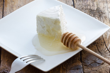 Tasty fresh cow Ricotta cheese with honey