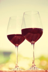 Two glasses with red wine, outside