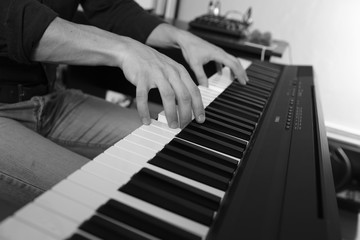 Playing the piano keyboard close up