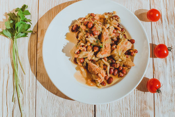 Chili Beans Stew with meat and cabbage, Bread, Red Chili Pepper And Garlic Ready To Be Served, concept of homemade healthy food