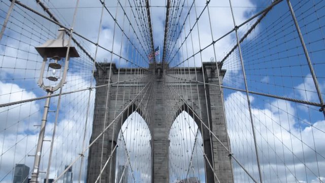 Architecture and engineering. The unique design of the Brooklyn bridge in New York. Dolly shot