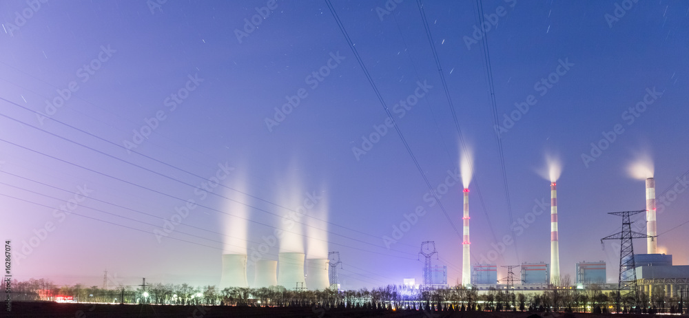 Wall mural power plant at night