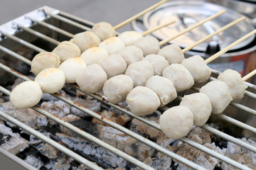 Grilled meatballs on the stove. Thai Street Food .