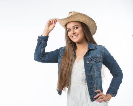 Teenage Girl with Cowboy Hat  and Denim Jacket iso;ated