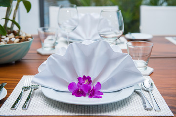 Decorated table with white napkin