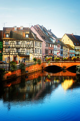 canal scene of Colmar, most famous town of Alsace, France, retro toned