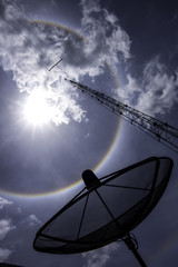 Satellite dish, Telecommunication tower with the halo and blue sky background