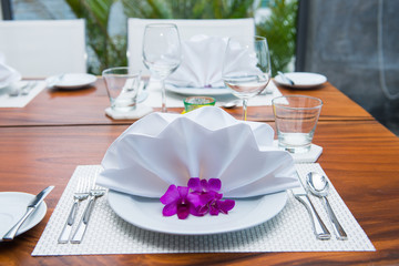 Decorated table with white napkin