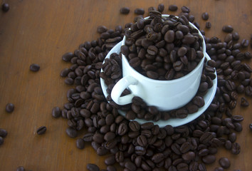 coffee beans on wooden background