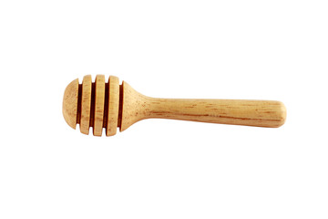 wooden honey dipper on white background, isolated