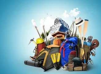 Gardinen Travel backpacks with climbing equipment and mountain in the background © Zarya Maxim