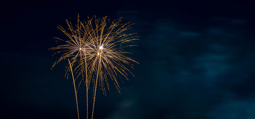 Orange Fireworks Blue Background - Powered by Adobe