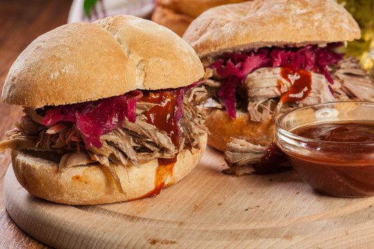 Pulled pork sandwich with red cabbage and bbq sauce