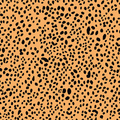 Seamless black and orange leopard animal skin pattern vector