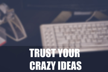 trust your crazy ideas with office blurring background