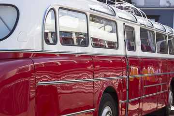 Old red vintage bus outdoor.
