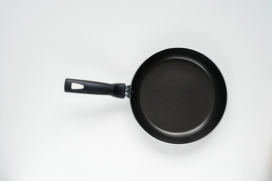 empty Frying pan on a white background