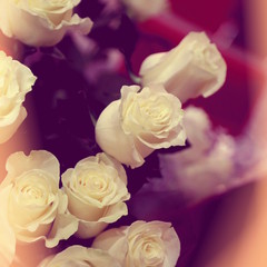 closeup of white roses bouquet, square format, old vintage photo effect