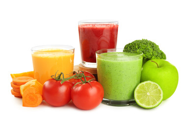 Fresh smoothies, vegetables and fruits on white background