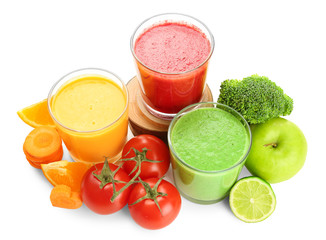 Fresh smoothies, vegetables and fruits on white background