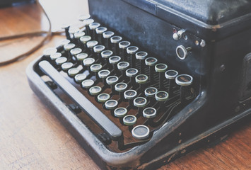 * Description/Title/Caption: 
Antique Typewriter. Vintage Typewriter Machine Closeup Photo.
