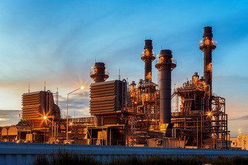 Gas turbine electrical power plant at dusk with twilight support all factory