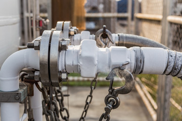 loading liquid co2 from Trailer Transport to storage tanker. 