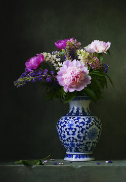 Still life with pink peonies in a chinese vase