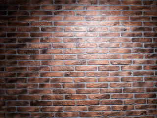Dark brown brick wall.