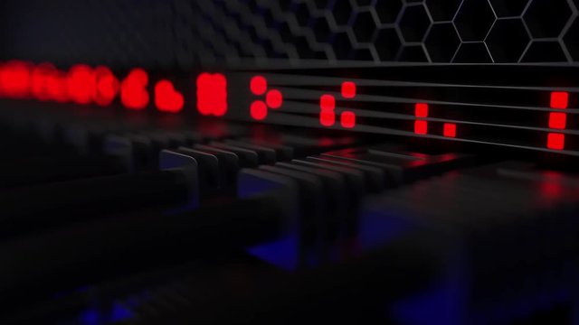 Operating servers and flashing red lamps, shallow focus. Cloud technology, data center or ISP concepts. Loopable motion background