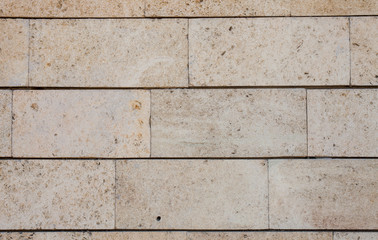 Pale brown brick or stone wall, useful texture for background (part2)