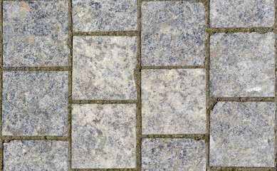 Obraz premium Stone pavement texture. Granite cobblestoned pavement background.