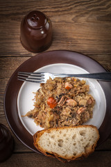 Traditional polish sauerkraut (bigos) with mushrooms and meat.
