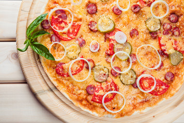 Assorted Pizza on the wooden background