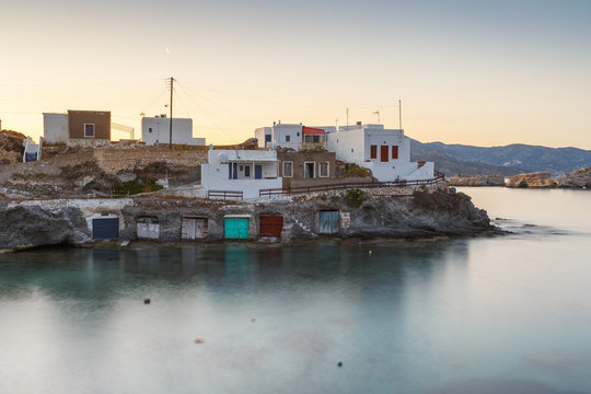 Boat houses in fishing village of Goupa on Kimolos island in Greece.
