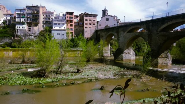 The old bridge in Roda de Ter crossig river in Catalonia in Sunny day
