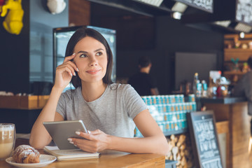  Young woman sitting in a coffee shop leisure
