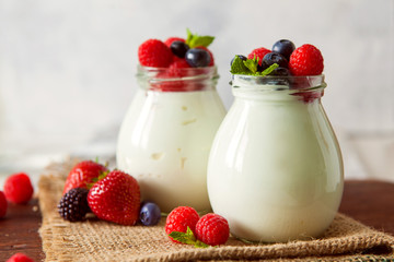 Natural yogurt with fresh berries and nuts
