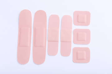Medical plasters on a white background