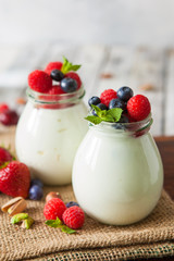 Natural yogurt with fresh berries and nuts