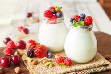 Natural yogurt with fresh berries and nuts